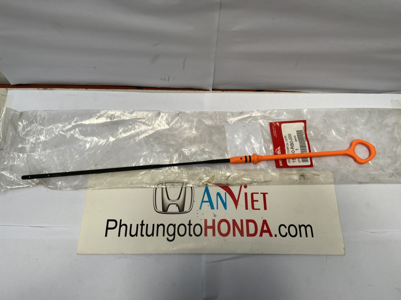 Que thăm dầu nhớt xe Honda City 2013